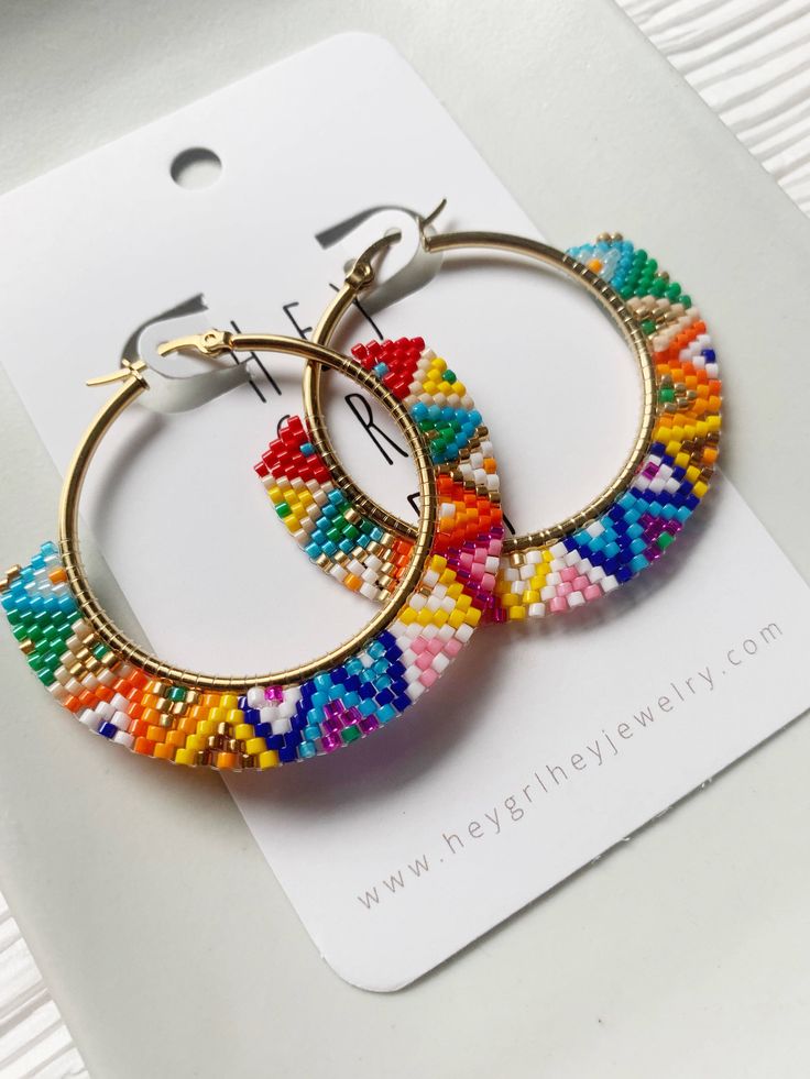 Approximate size: 2 inches Material: Gold plated stainless steel + seed beads Cheap Circular Beaded Earrings For Gifts, Cheap Circular Beaded Earrings As Gift, Cheap Multicolor Beaded Hoop Earrings, Cheap Multicolor Beaded Circle Earrings, Cheap Fun Round Beaded Earrings, Colorful Cheap Hoop Earrings With Beads, Cheap Playful Beaded Earrings, Cheap Colorful Beaded Hoop Earrings For Party, Cheap Trendy Multicolor Beaded Earrings