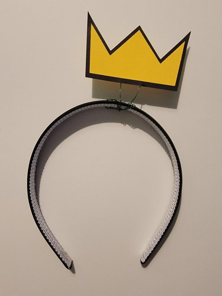 a paper crown on top of a headband