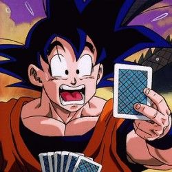 a cartoon character holding up some cards and an electronic device in one hand with his mouth open