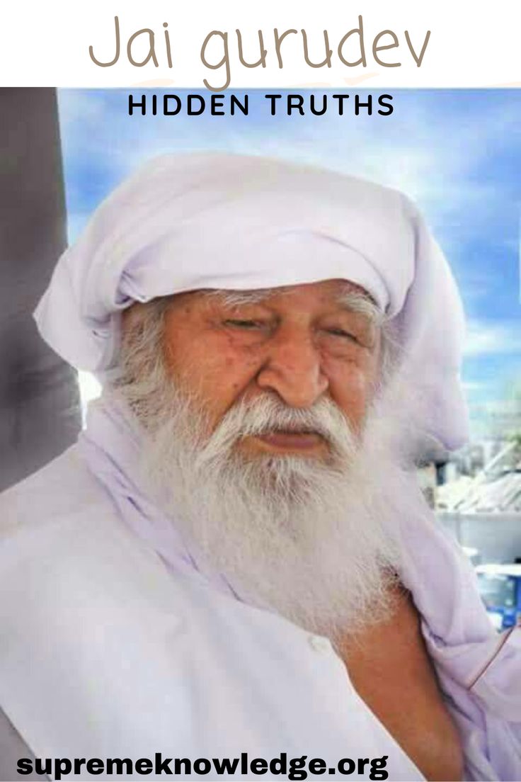 an old man with white hair and beard wearing a white turban