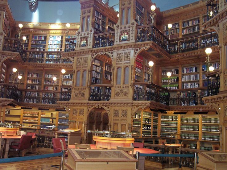 a library filled with lots of books and lights