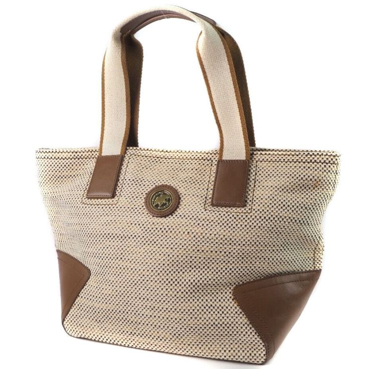 Store Item No. 57200453 Brand Hunting World Material Canvas/Leather Color Beige Size(Cm) H:26cm X W:40cm X D:16cm Handle Height18cm Size(Inch) H:10.2 X W:15.7 X D:6.3inch Weight 545g Country Of Manufacture America Specification Closing Ceremonymagnet Type Inside Open Pocket X 1 Diagonal Or Shouldershoulder Accessories None Condition Rank B Exteriorfine Scratchaging Condition Rank N New Brand New With Tags. S New / Unused New Item, But May Have Insignificant Scratches Or Slight Discoloration Due Luxury Beige Coated Canvas Shoulder Bag, Luxury Beige Travel Bag, Luxury Beige Coated Canvas Bag, Rectangular Tan Bag With Leather Trim, Classic Shoulder Bag With Braided Handles In Natural Color, Tan Rectangular Bags With Leather Trim, Tan Rectangular Bag With Leather Trim, Classic Beige Shoulder Bag With Braided Handles, Elegant Canvas Satchel For Errands