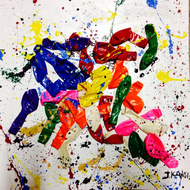 an abstract painting with multicolored paint splattered on it