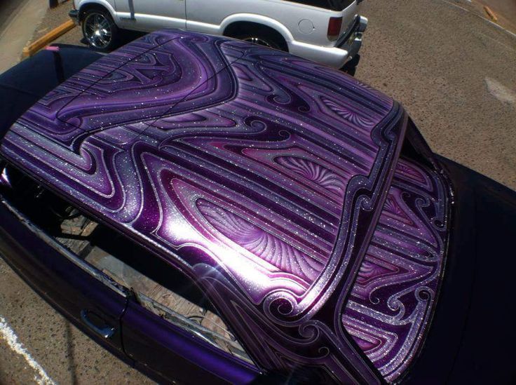 a car that has been painted with purple paint