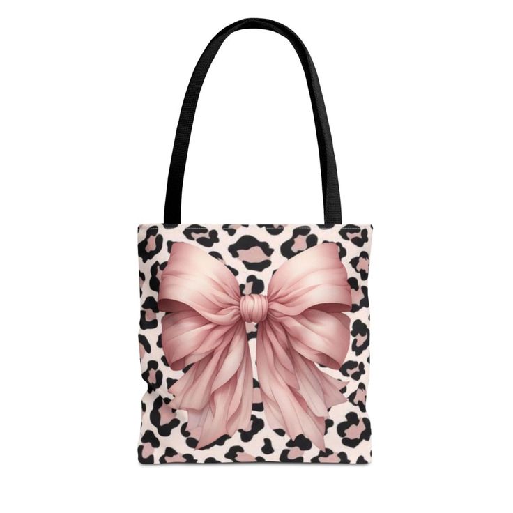 Enhance your style with our modern black and blue animal print tote bag, the ultimate fashion accessory that perfectly combines elegant design with practicality. Perfect for any occasion, this stylish tote bag is not only a statement piece, but is also durable and roomy enough to carry your essentials, making it an essential addition to your wardrobe. Get yours today and transform your look! Product features - Made with 100% polyester for durability - Reinforced stitching on handles for extra st Trendy Large Capacity Bags For Gifts, Chic Double Handle Bag For Gift, Chic Bag With Handles As Gift, Animal Design Shoulder Bag For Daily Use, Trendy Pink Bags With Animal Design, Animal Design Tote Shoulder Bag For Daily Use, Daily Use Animal Design Tote Shoulder Bag, Chic Square Gift Bag, Large Capacity Leopard Print Bag For Shopping