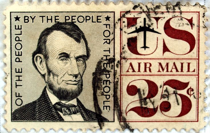 a postage stamp with an image of abraham lincoln on it and the words, by the people for air mail