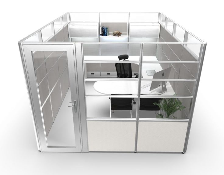 an office cubicle with glass walls and doors