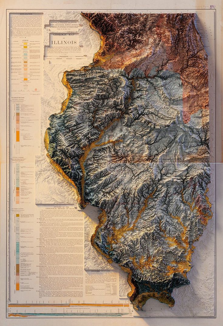 a large map with mountains and rivers on it's sides, in the middle of an open book