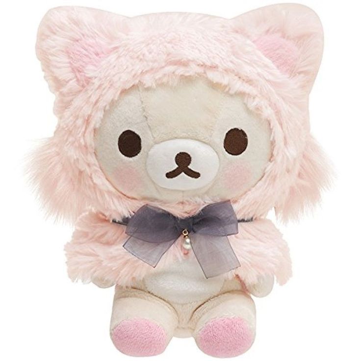 a white teddy bear with a pink fur coat on it's head and bow tie