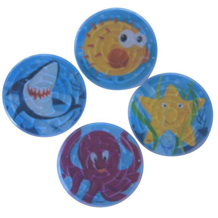 three plastic buttons with cartoon animals and sharks in the middle one has an octopus, shark, and fish on it