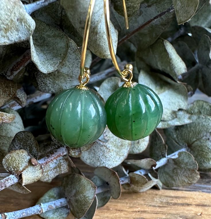 Canadian Nephrite Jade Earrings are set on sterling silver gold-plated earrings. These are a new style for us; I do not have a stopper yet, so please wear them carefully. The jade is approximately 13mm