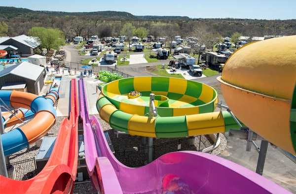 an aerial view of a water park with many rides