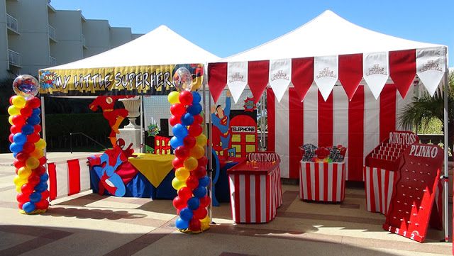 a circus tent with red, white and blue decorations