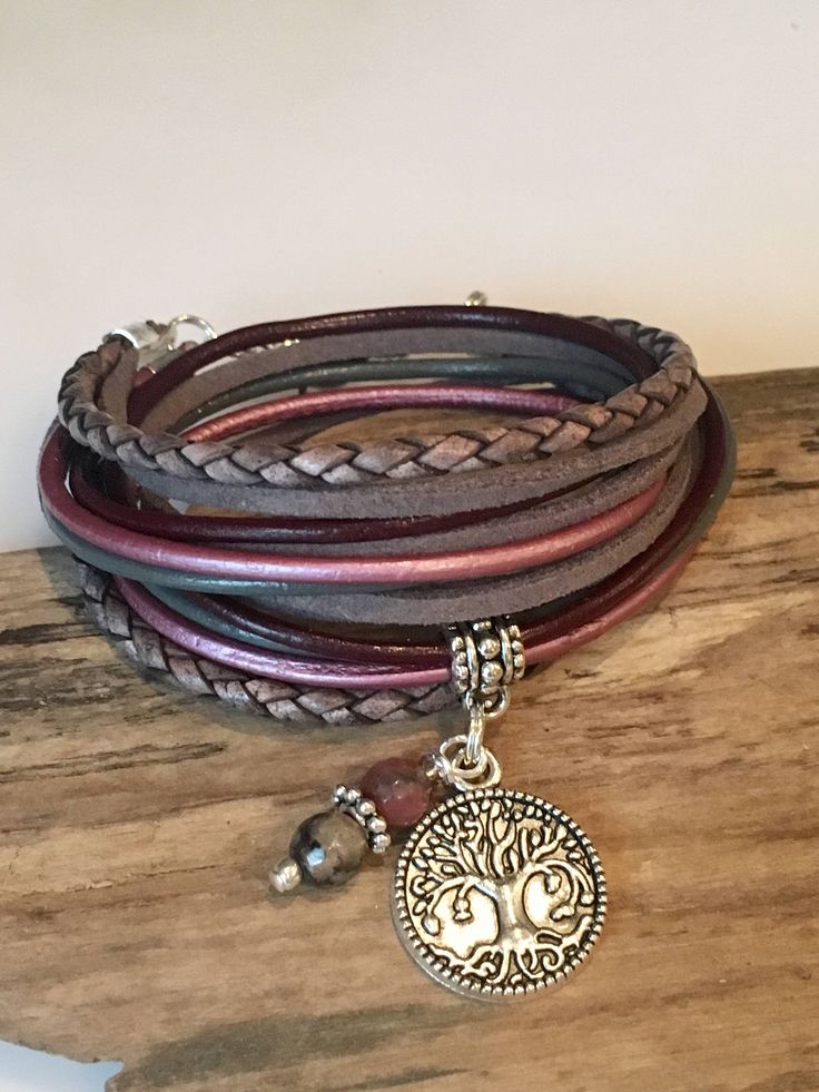 This bracelet is Perfect if you like the boho style with natural leather with that cool Boho Style! Beautiful shades of Gray, burgundy and berry made with genuine bolo braided cord, soft suede cord and 2mm round leather cord. This wrap is made to wrap around your wrist twice and enclosed with a lobster clasp. It has a small extension chain on the end to adjust to a snug or loose fit. Your bracelet comes with the little 6mm drop beads shown and your choice of silver charm. Take a look at the last Bohemian Pink Wrap Bracelet For Festival, Bohemian Nickel-free Wrap Bracelet As Gift, Bohemian Purple Wrap Bracelet Gift, Bohemian Purple Wrap Bracelet For Gift, Adjustable Burgundy Bracelets, Bohemian Nickel Free Purple Bracelets, Pink Bohemian Wrap Bracelet, Bohemian Purple Nickel-free Bracelet, Bohemian Nickel-free Purple Bracelets