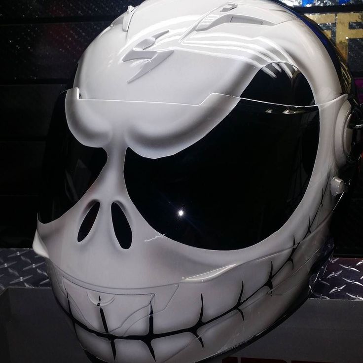 a helmet with a skull face painted on it