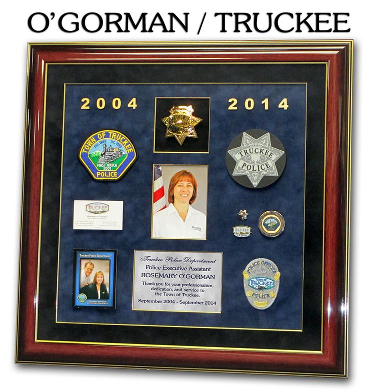 a police officer's shadow is on display in a framed frame with the words, 2009 - 2014