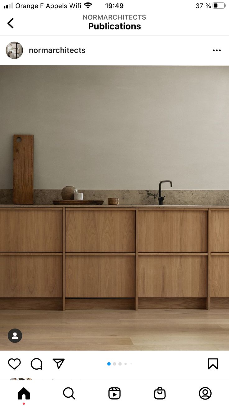 an image of a kitchen with wooden cabinets