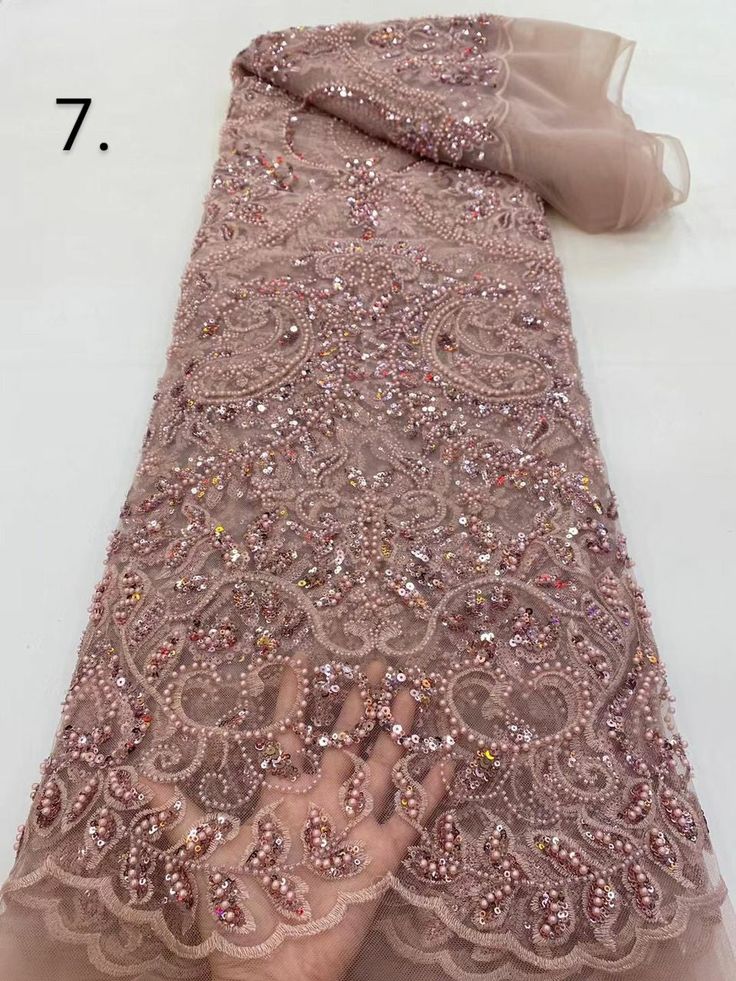 This high quality Fabric is measured in 5 Yards With Embroidered Beading and Sequin. It is soft, very delicate and beautiful. This high Quality Fabric is made with Fashion embroidered rhinestones can be used in making party wedding dresses, skirts, shawls, scarves and other other fashion apparels as you would like. Size : Length : 5 yards (180 inch). Width: 50 inch (Please allow slight deviation for the measurement data ,±1 inch) Material: 100% Polyester, Tulle Lace Fabric, Eco-Friendly embroide Luxury Pink Sequin Fabric With Zari Work, Luxury Festive Sequin Fabric With Sheer Dupatta, Luxury Gold Sequin Fabric For Evening, Elegant Pink Embroidered Sequin Fabric, Pink Lace Fabric With Rhinestones Embroidery, Pink Embroidered Fabric With Rhinestones For Wedding, Pink Rhinestone-embroidered Lace Fabric, Elegant Pink Embellished Tulle Fabric, Brown Wedding Themes