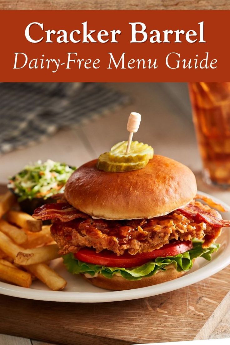 a chicken sandwich and fries on a plate with the title cracker barrel dairy - free menu guide