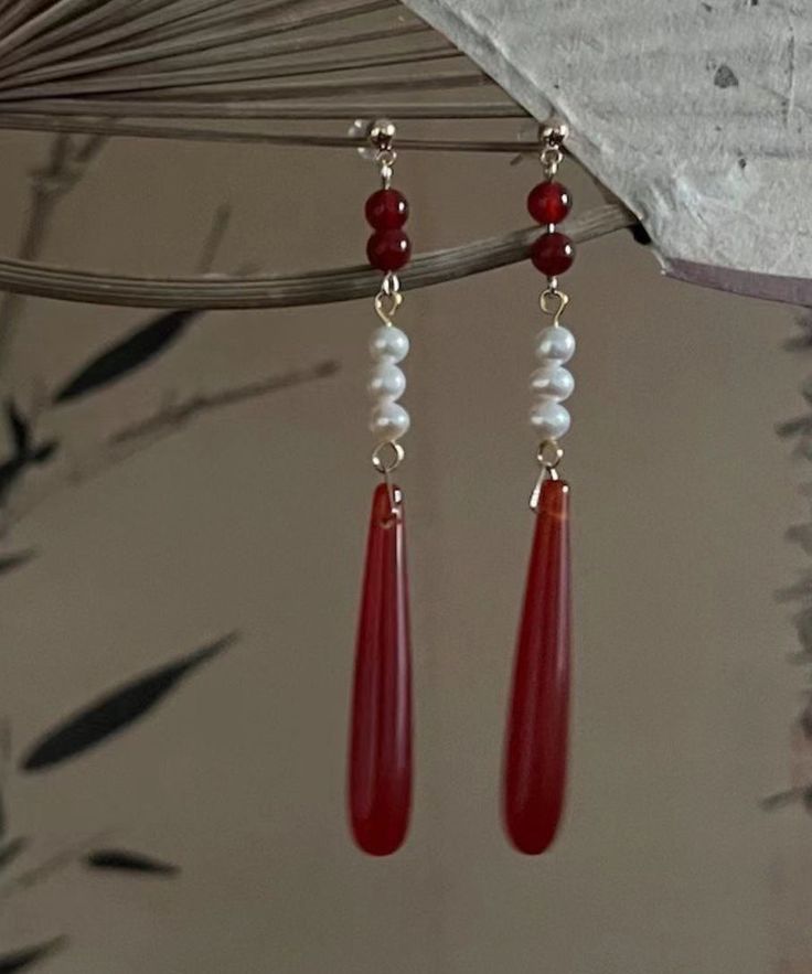 Retro Red Alloy Acrylic Pearl Agate Drop EarringsMade of fine Alloy Acrylic Pearl Agate.Measurement: 7.2cm/2.808" * 0.7cm/0.273". Matches easily with daily hairstyle, dresses & Shirts Red Agate Earrings With Natural Stones, Red Agate Earrings For Gift, Red Agate Earrings As Gift, Red Carnelian Gemstone Earrings, Red Carnelian Pierced Earrings, Red Carnelian Earrings, Red Agate Dangle Earrings, Red Carnelian Teardrop Earrings, Red Carnelian Earrings With Ear Wire