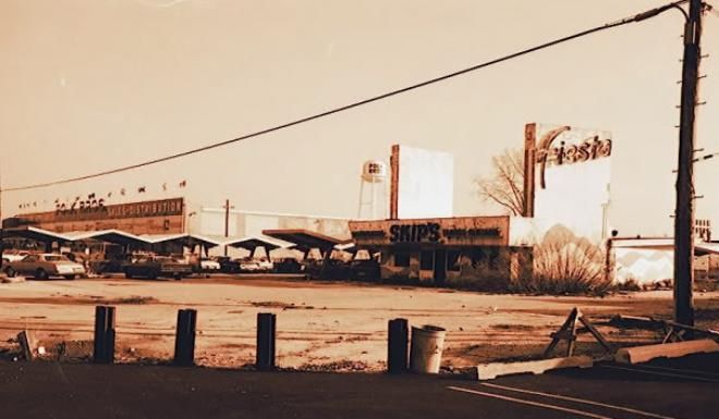 an old photo of the outside of a building