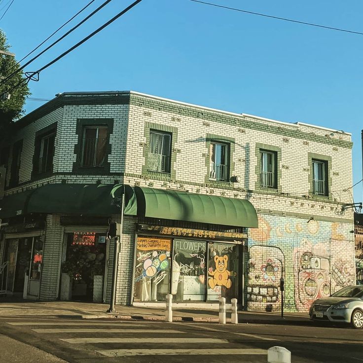 an old building with graffiti all over it