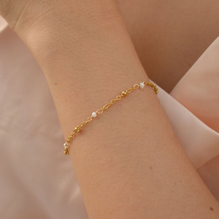 This beautiful Dainty Pearl Bracelet Set is suitable for any look adding an elegant touch, wear it every day and mix it with your fave necklaces. I love this piece for wedding occasions, brides or bridesmaids and is an excellent gift option. Made of Freshwater Pearls and 18k gold plated Stainless Steel chain and findings.DETAILS:Water Resistant -Nickel-free - Skin friendlySizes : 6" , 7"+1" Adjustable extender chainNotice this is a natural pearl, therefore, it may vary in shapes Dainty Pearl Bracelet, Natural Pearl, Natural Pearls, Steel Chain, Stainless Steel Chain, Pearl Bracelet, Bracelet Set, Everyday Fashion, 6 Inches