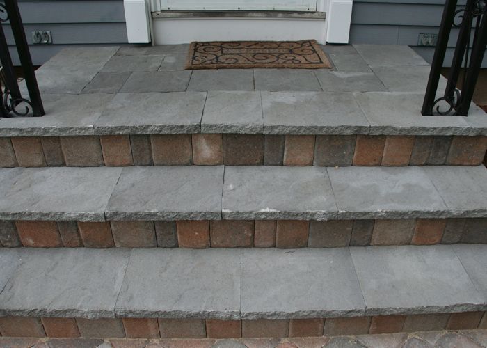 steps leading up to the front door of a house