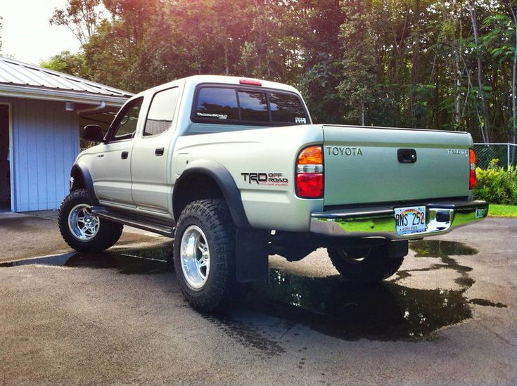 there is a truck parked in the driveway