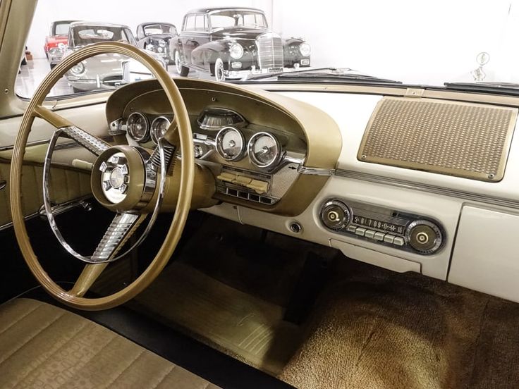 the interior of an old car is clean and ready to be used