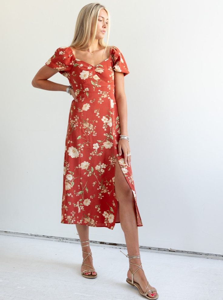 The Janie Floral Dress is a fun fall dress that is perfect for a special occasion or an evening out. Featuring gentle puff sleeves, a structured bodice with seam detailing, and smocking at the back for added comfort. Fit: True to sizeFabric Content: 100% PolyesterFabric Care: Machine Wash Cold Gentle Cycle, lay flat to dryMeasurements: 49" Shoulder to hemLining: Yes 100% PolyesterZipper: No S:0-2 M:4-6 L:8-10 Fitted V-neck Dress With Gathered Neckline, Puff Sleeve Dress With Floral Print And Fitted Bodice, Fitted Midi Dress With Ruched Bodice For Casual Wear, Fitted Midi Dress With Ruched Bodice For Dress Down, Flowy Floral Print Midi Dress With Puff Sleeves, Fitted Floral Print Puff Sleeve Dress Down, Fitted Floral Print Puff Sleeve Dress For Casual Occasions, Floral Print Puff Sleeve Dress With Fitted Bodice, Fitted Midi Dress With Smocked Back