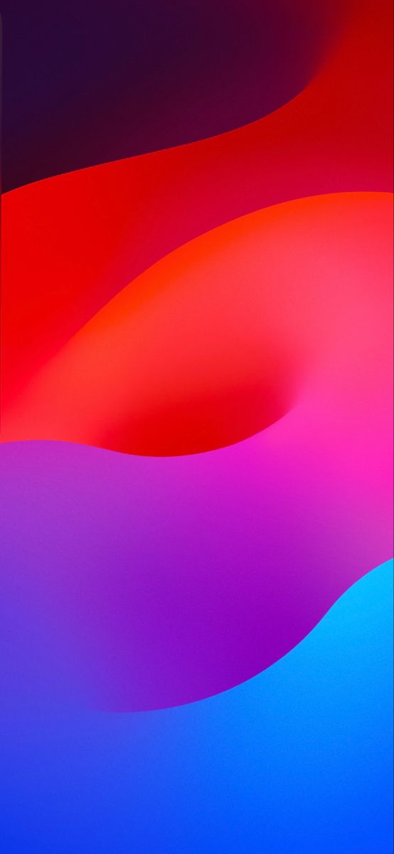 an abstract background with red, pink and blue colors in the middle is shown here