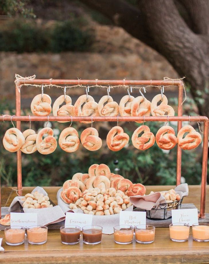 an assortment of doughnuts on display at a wedding