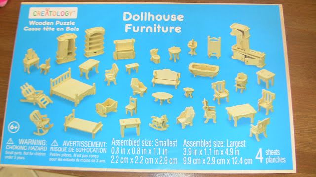 the dollhouse furniture set is in its box