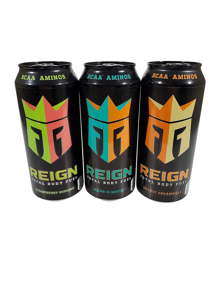 three cans of reign energy drink on a white background