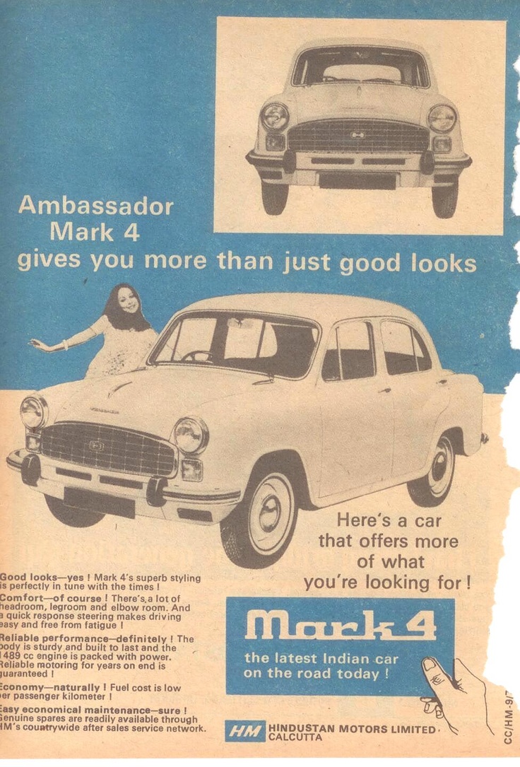 an old advertisement for a car with two women standing next to it