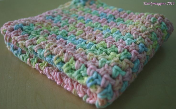 a crocheted dish cloth sitting on top of a table