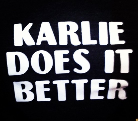 karlie does it better t - shirt with white letters on the front and back