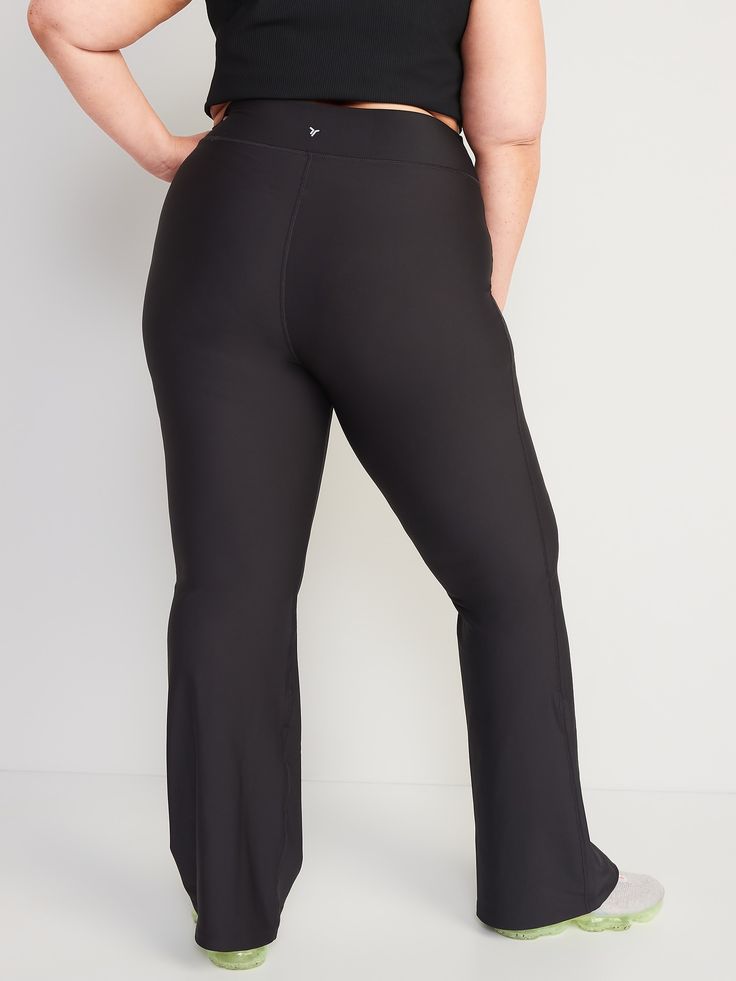 hidden front pocket go-dry wicks moisture extra high waist is 1" higher than standard high rise sits above belly button fitted hip and thigh hits below ankle 31 1/2" regular inseam 29 1/2" petite inseam 35 1/2" tall inseam models are approx.  5'9" and wear sizes s (4), l (12), and xl (18)machine wash according to the care instruction label polyester 77% spandex 23% Athleisure Compression Bottoms With 5-inch Inseam, High Waist Black Bottoms With Moisture-wicking, High Waist Black Moisture-wicking Bottoms, High Waist Moisture-wicking Black Bottoms, High Waist Pants With Contoured Waistband, Black Compression Pants With 5-inch Inseam, Solid Moisture-wicking Bottoms With 5-inch Inseam, High Waist High Stretch Bottoms With Pockets, High Waist Yoga Bottoms With Pockets