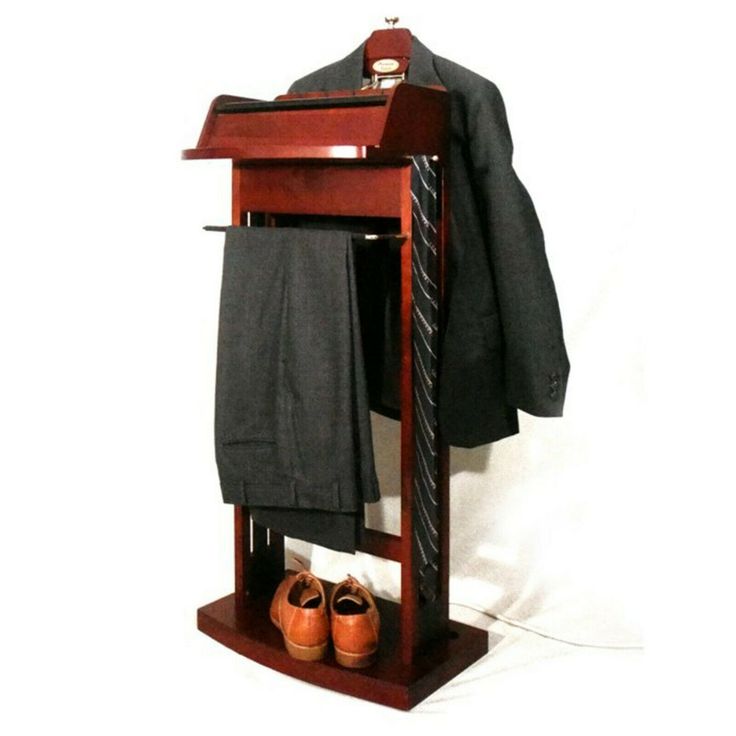 a suit and tie hanger with shoes on it in front of a white background