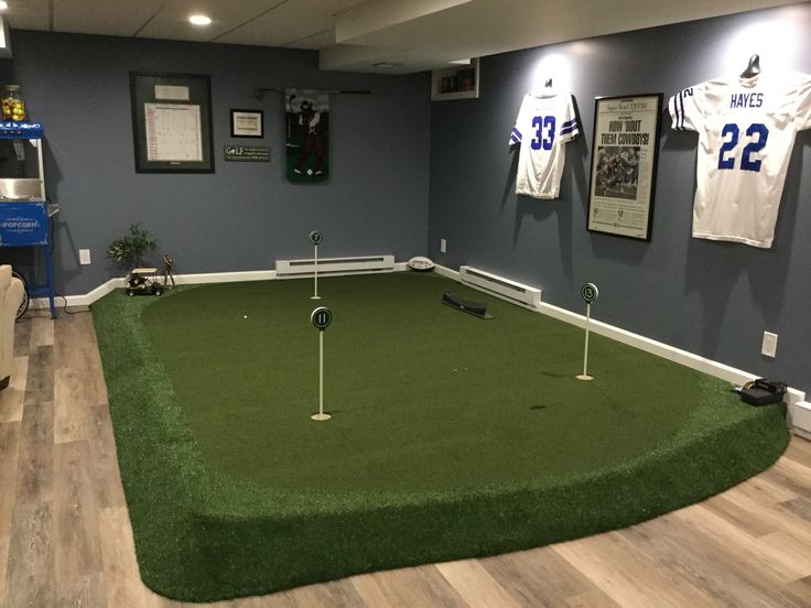 Our indoor putting green. Love it. Golf Backyard, Golf Man Cave, Golf Studio, Home Golf Simulator, Simulator Room, Indoor Mini Golf, Golf Simulator Room, Golf Room, Diy Golf