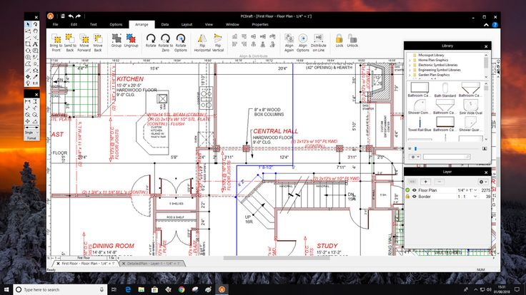 a computer screen showing the layout of a house with blueprints and drawings on it