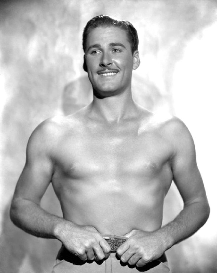 black and white photograph of a shirtless man