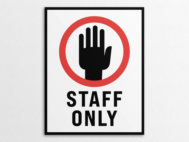 a sign that says staff only with a hand in the center and red circle above it