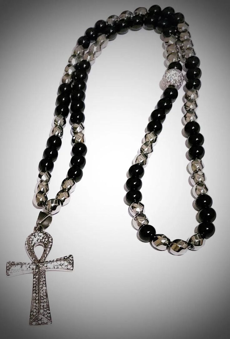 Black and Silver Ankh Necklace freeshipping - L.Signature Collection by L.Styles Black Spiritual Crystal Necklace With Faceted Beads, Spiritual Black Crystal Necklaces With Faceted Beads, Spiritual Black Beads With Silver Accents, Spiritual Black Crystal Necklace With Faceted Beads, Silver Cross Jewelry With Black Beads, Silver Hematite Necklace With 8mm Beads, Black Hematite Jewelry With Silver Beads, Adjustable Cross Necklace With 8mm Beads, Silver Hematite Necklace With Gemstone Beads