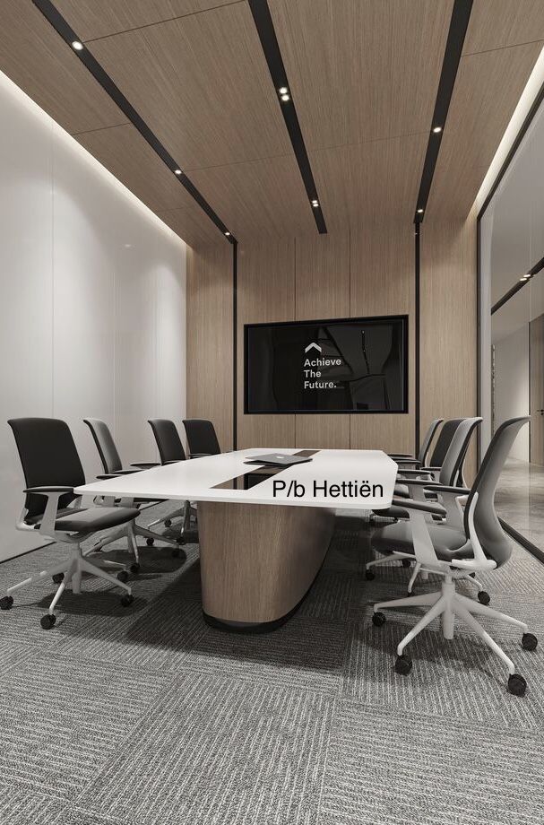 an empty conference room with black and white chairs