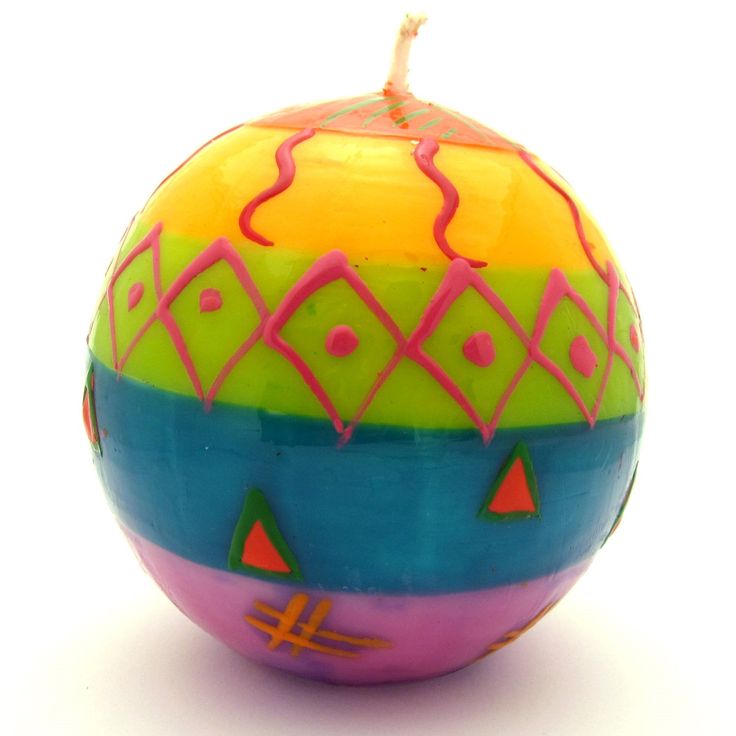 an ornament shaped like a ball with colorful designs on the outside and inside