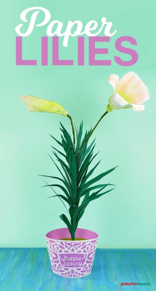 a pink and white flower in a pot with the words paper lilies on it