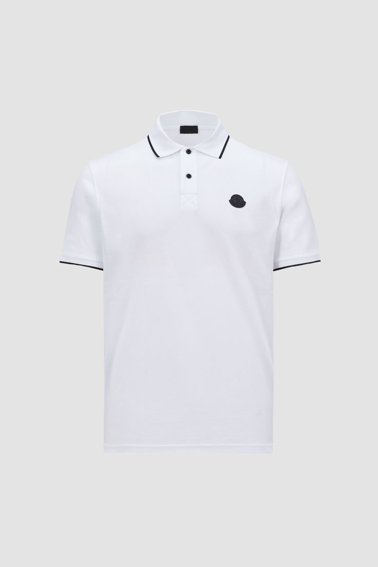 A Moncler classic, this polo shirt is crafted from cotton piquet. A silicone logo patch adorns the chest, while bold logo lettering is emblazoned on the back. Designer Cotton Polo Shirt With Embroidered Logo, Luxury Polo Collar Top With Embroidered Logo, Designer Collared Polo Shirt With Logo, Classic Polo Shirt With Logo Print For Streetwear, Classic Collared Polo Shirt With Logo Detail, Classic Polo Shirt With Ribbed Collar For Streetwear, Luxury White Polo Shirt With Ribbed Collar, Collared Cotton Polo Shirt With Logo, Cotton Collared Polo Shirt With Logo