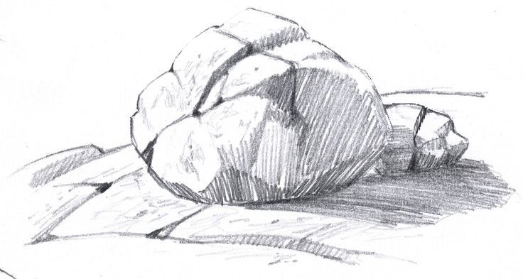 a pencil drawing of a rock on the ground